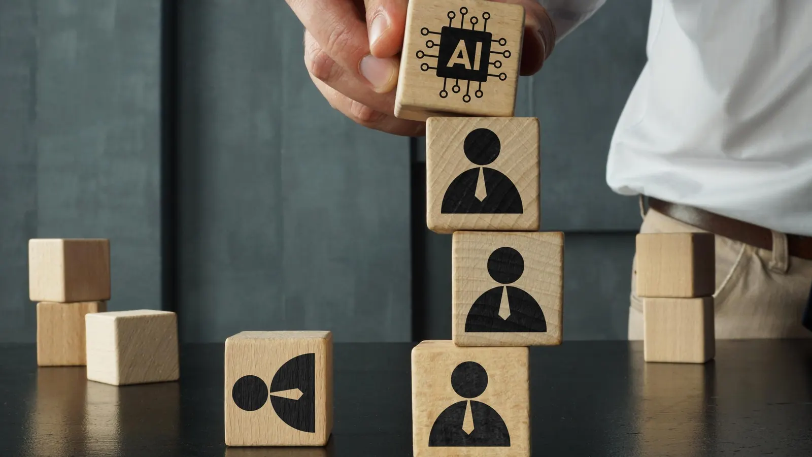 Diverse group of professionals collaborating in a modern office, some engaging with AI-powered interfaces on screens.
